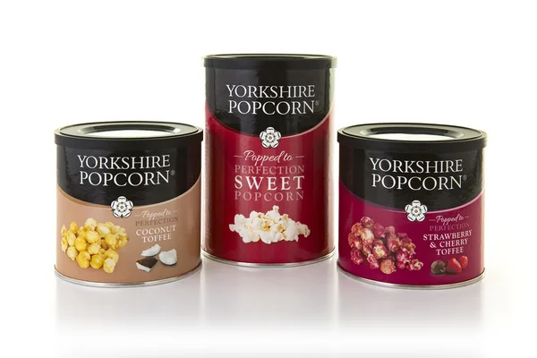 Three Tins of Yorkshire Popcorn on a White Background — Stock Photo, Image