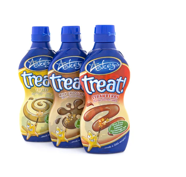 3 Bottles of Askeys Treat Desert Sauce on a white background — Stock Photo, Image