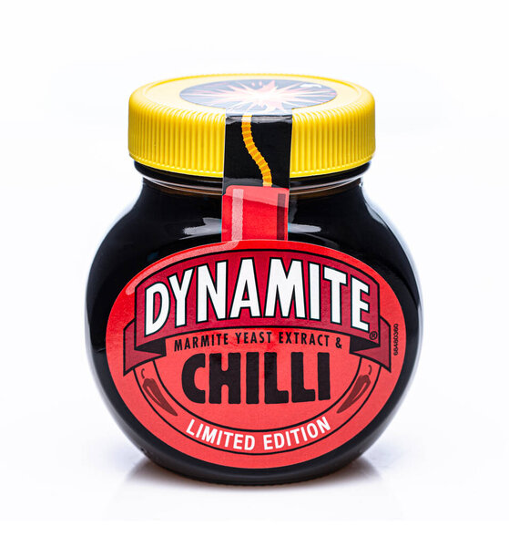 SWINDON, UK - APRIL 14, 2021: Jar of Dynamite Chilli Marmite Limited Edition on a white background