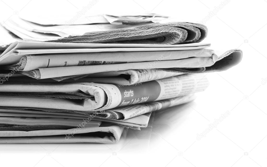newspapers over white background 