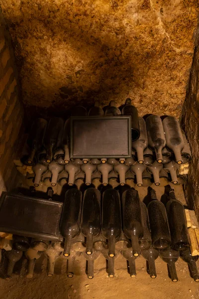 bottles of wine in  old cellar in center of Eger, Northern Hungary