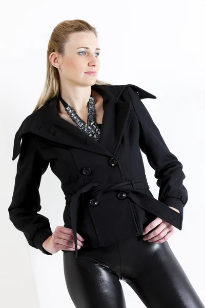 Portrait of standing woman wearing black clothes — Stock Photo, Image