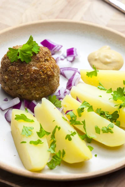 Rissole with cooked potatoes — Stock Photo, Image