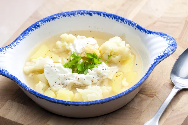 Cauliflower soup in plate — Stock Photo, Image