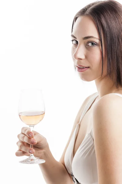 Porträtt av ung kvinna med ett glas rosévin — Stockfoto