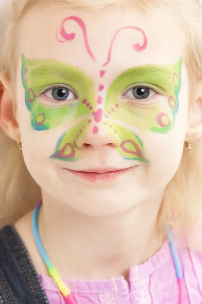 Kleines Mädchen mit Kinderschminken — Stockfoto