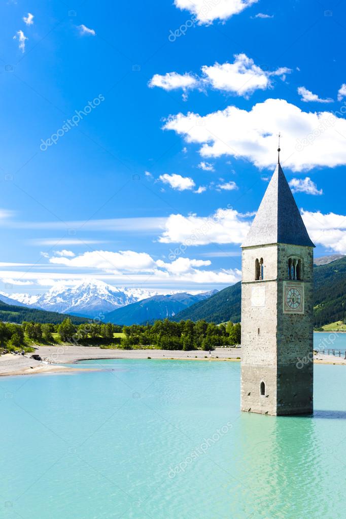 Tower of sunken church in Resia lake