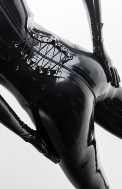 ayrıntı duran kadının lateks Giyim Eşyası