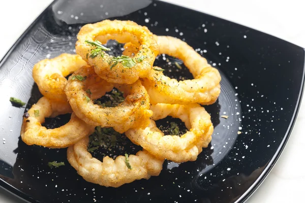 Fried cuttlefish rings in batter — Stock Photo, Image