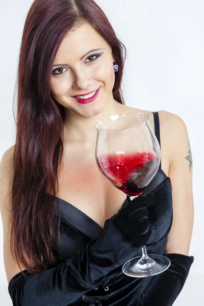 Young woman with a glass of red wine — Stock Photo, Image