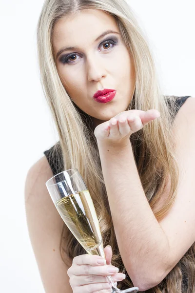Portrait of young woman with a glass of champagne — Stock Photo, Image