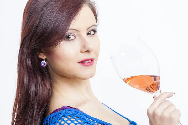 Portrait of young woman with a glass of rose wine — Stock Photo, Image