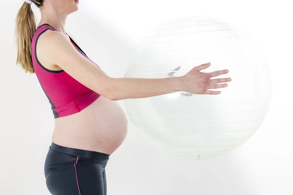 Detail van de zwangere vrouw doen oefeningen — Stockfoto