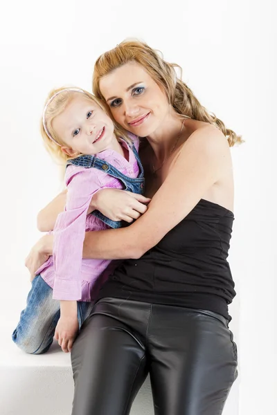 Portrait of little girl with her mother — Stock Photo, Image