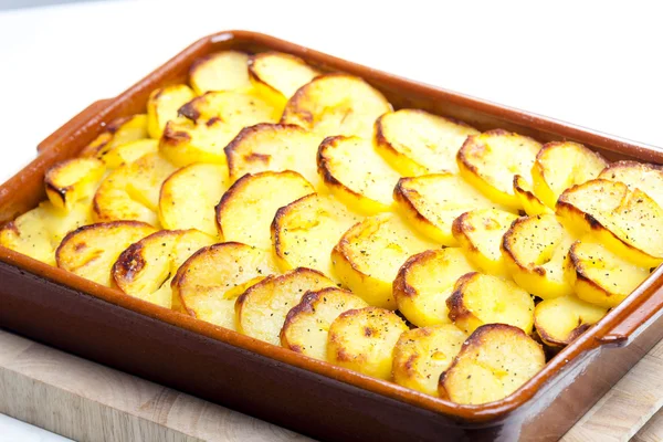 potatoes baked with pork minced meat and red cabbage