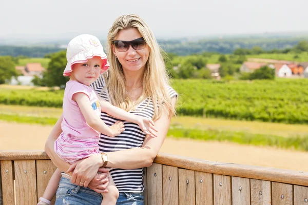 Portrait of mother with her daughter in summer — Stock Photo, Image