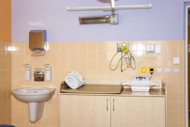 equipment in a maternity hospital clipart