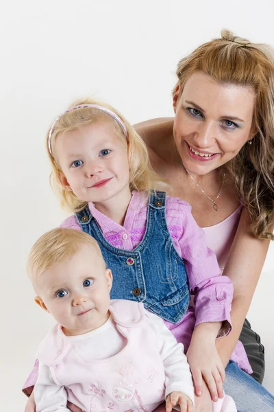 Portrait of mother with her baby and daughter — Stock Photo, Image