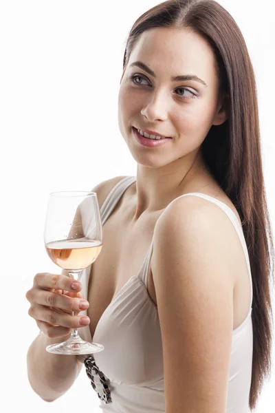 Retrato de mujer joven con una copa de vino rosa — Foto de Stock