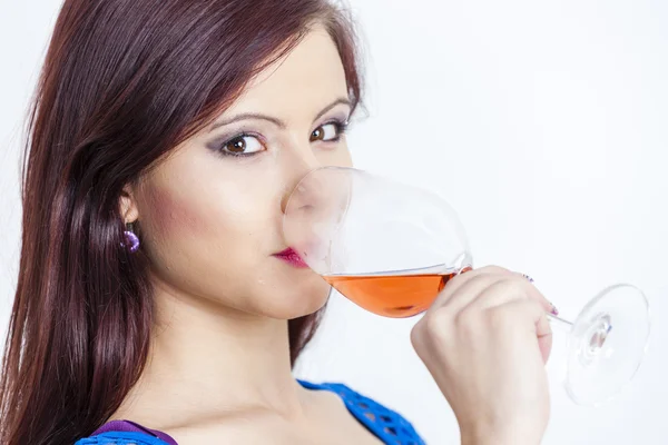 Young woman drinking rose wine — Stock Photo, Image