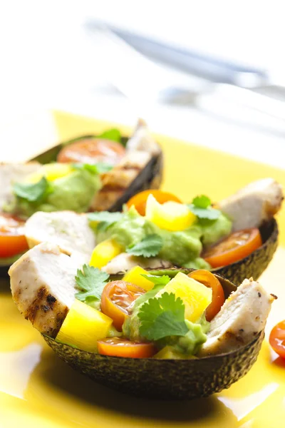 Avocado filled with chicken salad and avocado dip — Stock Photo, Image