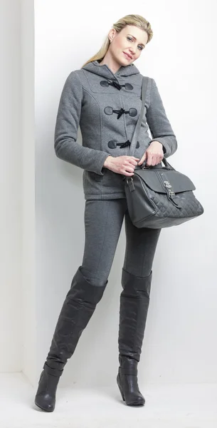 Woman wearing grey clothes — Stock Photo, Image