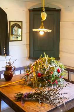 Traditional Czech Easter decorations including pussy willows and an evergreen tree with ribbons