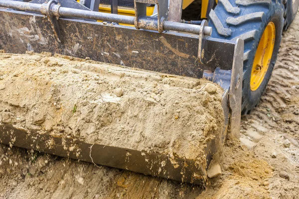 Detalhe da escavadeira no canteiro de obras — Fotografia de Stock