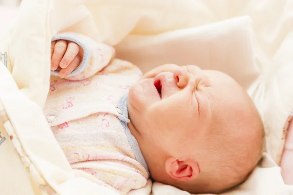 Portrait of crying newborn baby girl — Stock Photo, Image