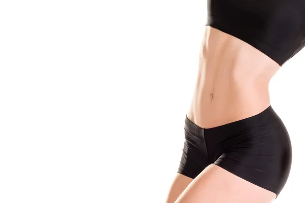 スリムで筋肉質の女性の腹筋 — ストック写真