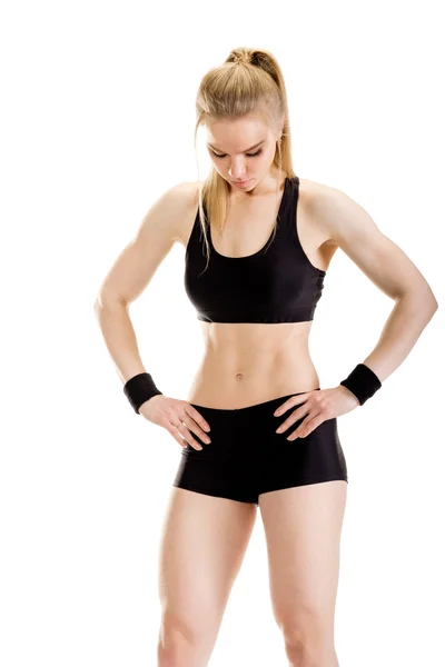Jovem mulher muscular posando — Fotografia de Stock
