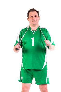 Olgun adam yeşil spor giyim poz giymiş