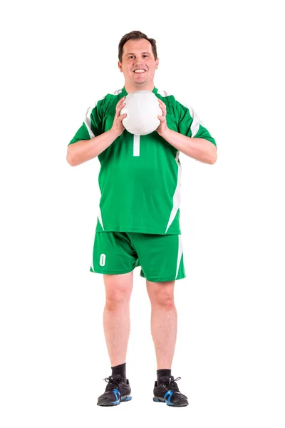성숙한 남자 옷을 입고 녹색 스포츠웨어 포즈 — 스톡 사진