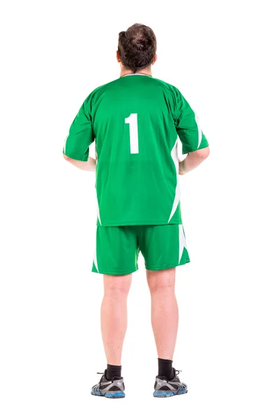 Hombre maduro vestido con ropa deportiva verde posando —  Fotos de Stock
