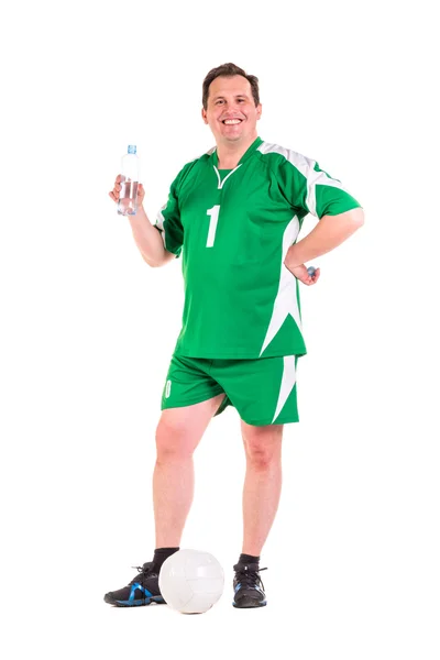 Ώριμη άντρας ντυμένος σε πράσινα αθλητικά είδη που ποζάρουν — Φωτογραφία Αρχείου