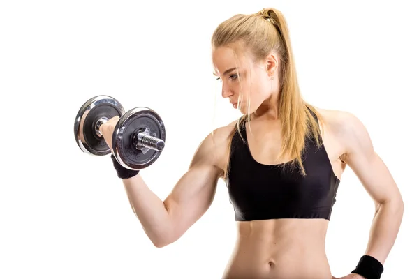 Jovem magro forte mulher muscular posando em estúdio — Fotografia de Stock