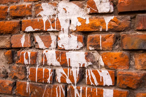 Manchas de tinta na parede de tijolo — Fotografia de Stock