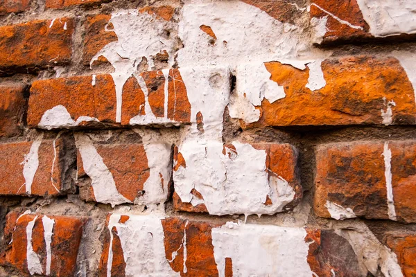 Manchas de tinta na parede de tijolo — Fotografia de Stock