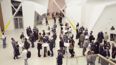 Crowd in hall during business seminar