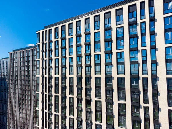 Modern building with windows and balconies — Stock Photo, Image