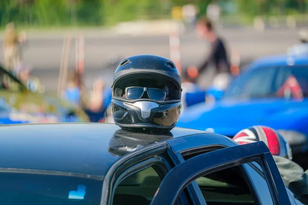 Street racing car with helmet — Stock Photo, Image