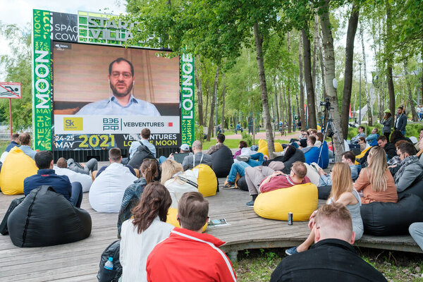 People participating in open air conference