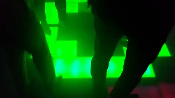 People dancing on the dance floor in a nightclub — Stock Video