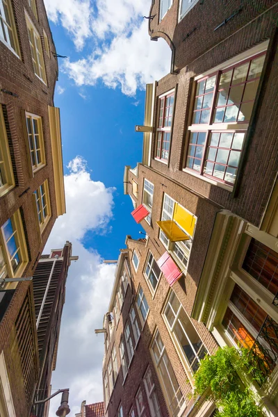 Facades of houses in old city in Amsterdam — Stock Photo, Image