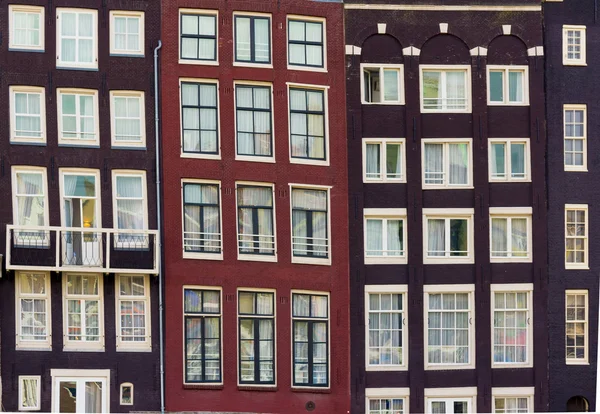 Facades of houses in old city in Amsterdam — Stock Photo, Image