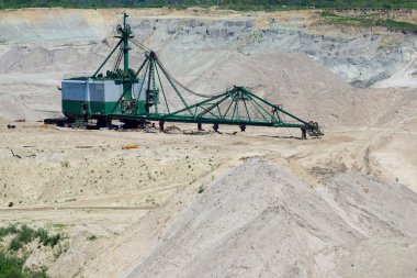 Amber open-cast mining in Yantarny clipart