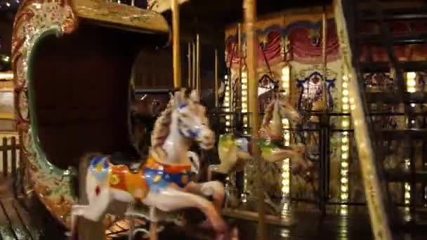 Merry-go-round carousel at evening — Stock Video