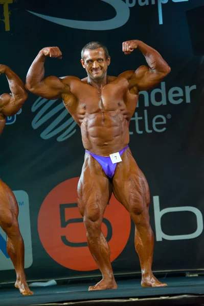 Atleten deltager i Bodybuilding Champions Cup - Stock-foto