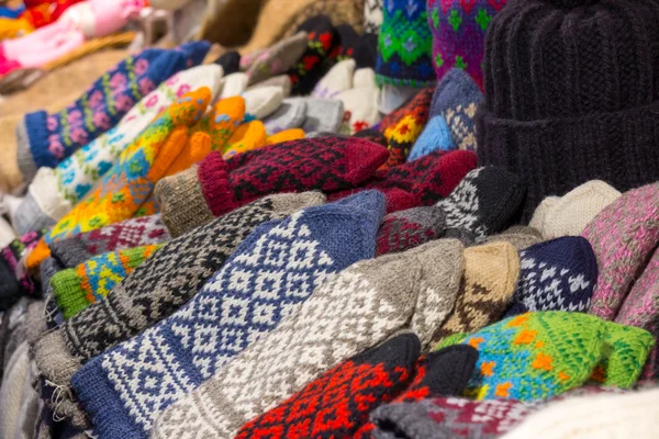 Handmade warm clothes for sale at Christmas market — Stock Photo, Image