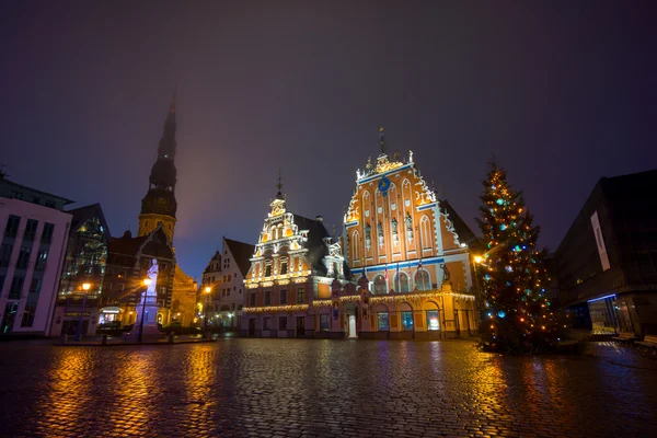 Illuminated house of the Blackheads — Stock Photo, Image